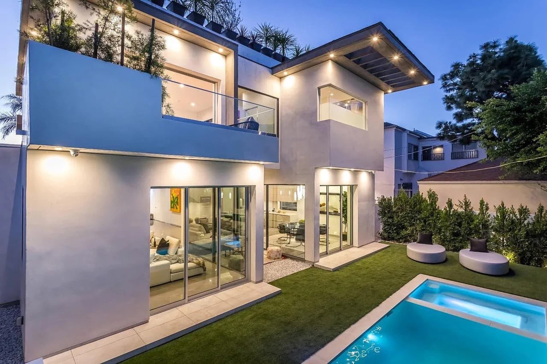 Evening elevation with cantilevered upper floor